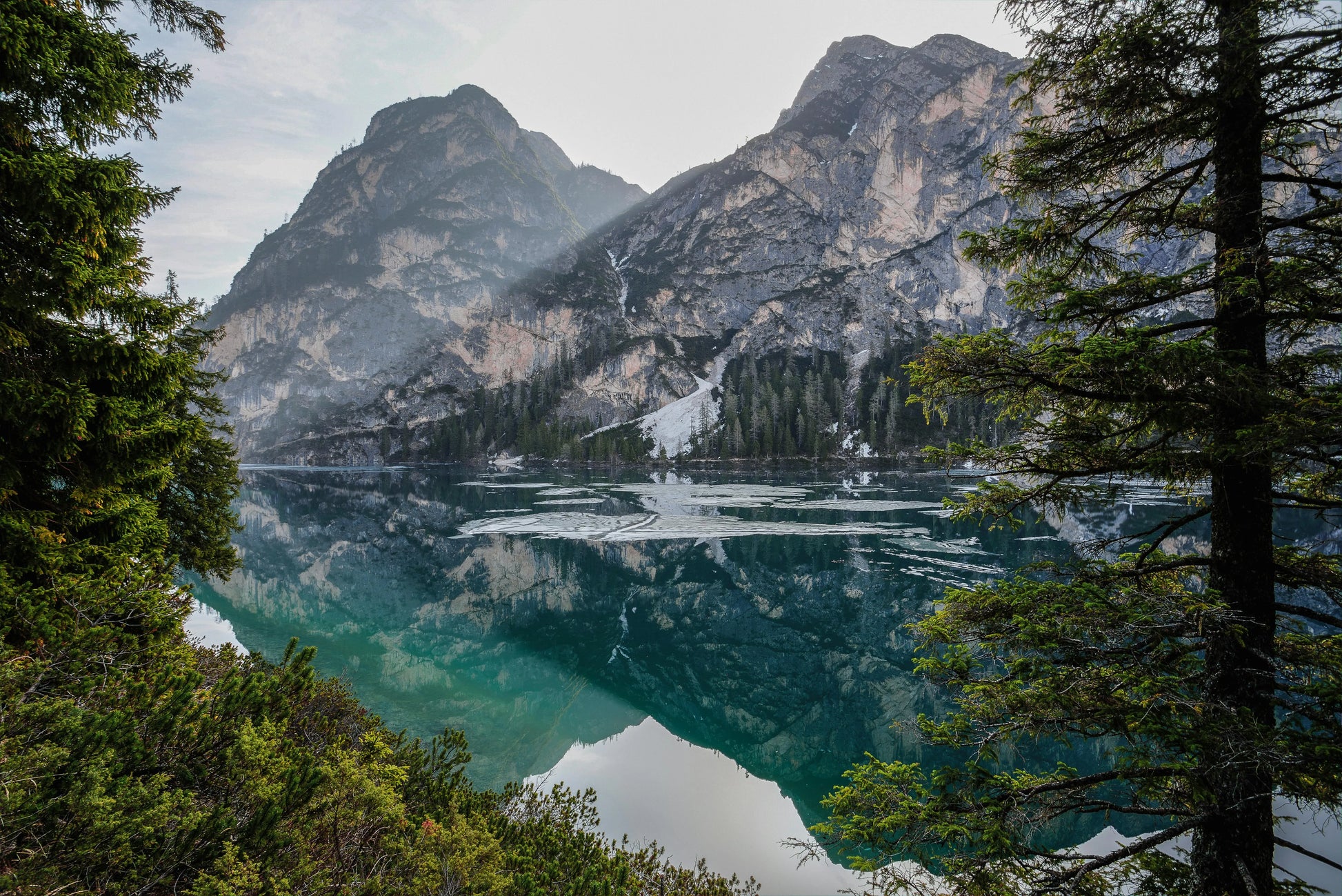 Lake surrounded by mountains and trees