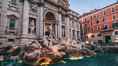 Famous fountain with classical statues in an urban setting